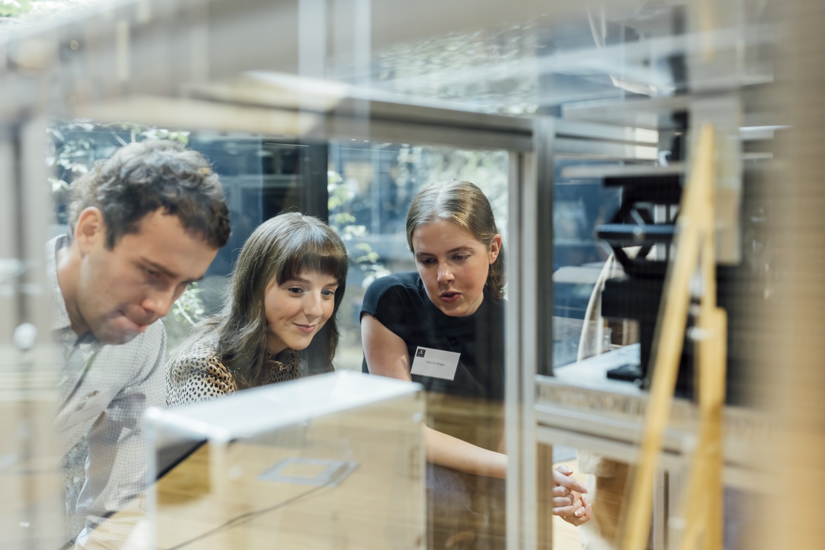 Students looking at project